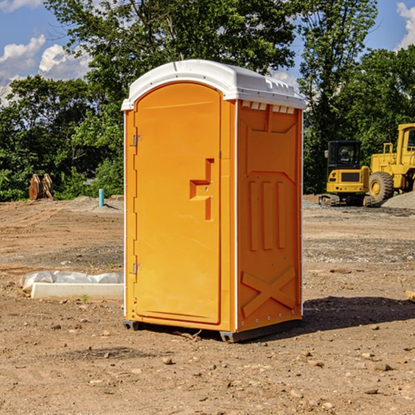 how often are the portable restrooms cleaned and serviced during a rental period in Richland Center